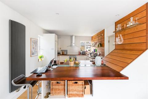 71 Quicks Road, London, SW19 1EX