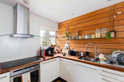 71 Quicks Road, London, SW19 1EX
