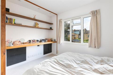 71 Quicks Road, London, SW19 1EX