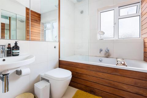 71 Quicks Road, London, SW19 1EX