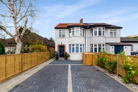 11 Grand Drive, Raynes Park, London, SW20 0JB