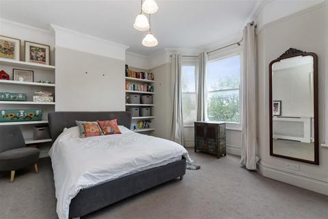 67 Alexandra Road, London, SW19 7LE