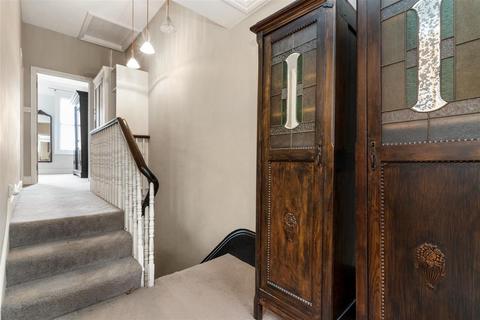 67 Alexandra Road, London, SW19 7LE