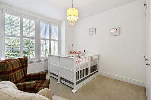 18 Kingsley Road, London, SW19 8HF