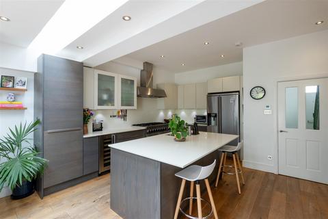 79 Effra Road, London, SW19 8PS