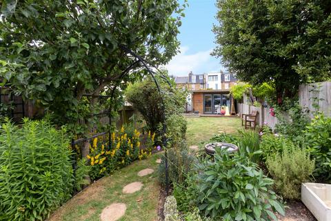 79 Effra Road, London, SW19 8PS