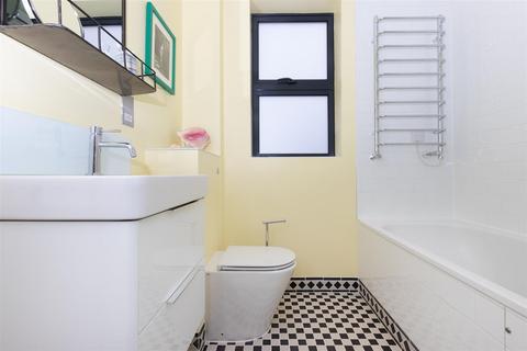 79 Effra Road, London, SW19 8PS