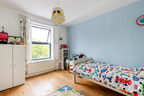 79 Effra Road, London, SW19 8PS