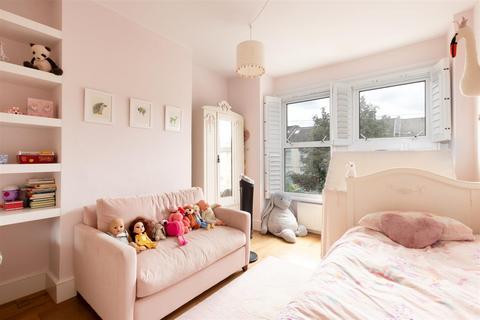 79 Effra Road, London, SW19 8PS