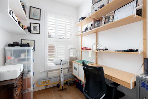 79 Effra Road, London, SW19 8PS