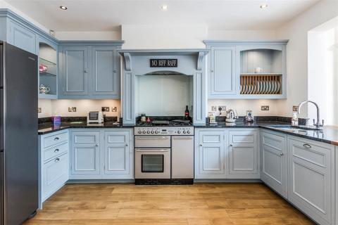 124 Westway, London, SW20 9LS
