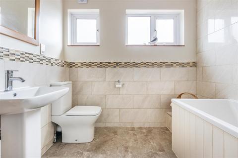 124 Westway, London, SW20 9LS