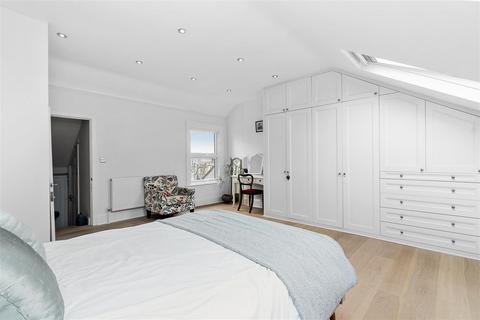 130 Gladstone Road, London, SW19 1QW