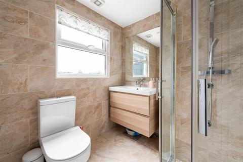42 Milton Road, London, SW19 8SE