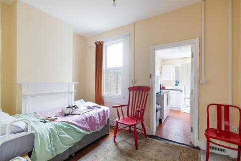 13 Bertram Cottages, London, SW19 1LQ