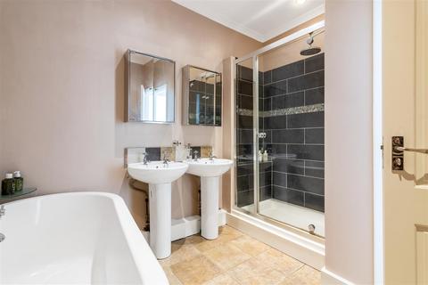 46a Quicks Road, London, SW19 1EY