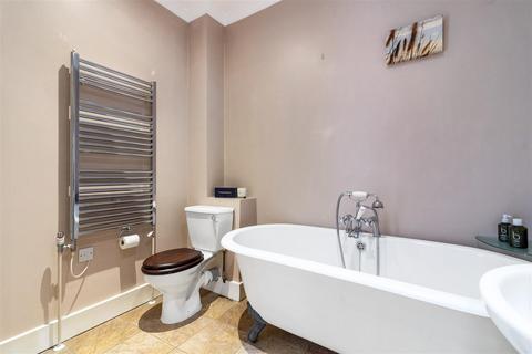 46a Quicks Road, London, SW19 1EY