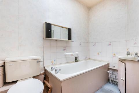 14 Warren Road, London, SW19 2HX