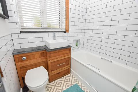 63 Hogarth Crescent, London, SW19 2DN