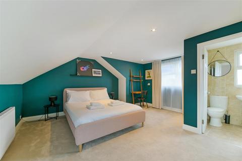 91a Boundary Road, London, SW19 2AW