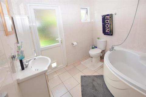 60 Briscoe Road, London, SW19 2AQ