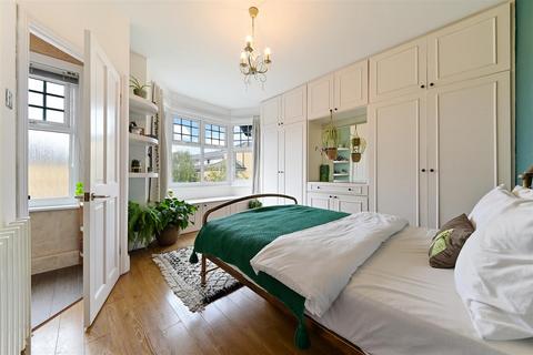 3 Mill Road, London, SW19 2NE