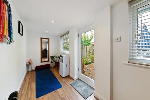 3 Mill Road, London, SW19 2NE