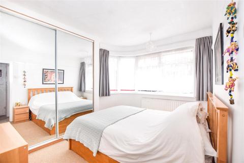174 Runnymede, London, SW19 2RG