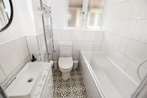 60 Runnymede, London, SW19 2PQ