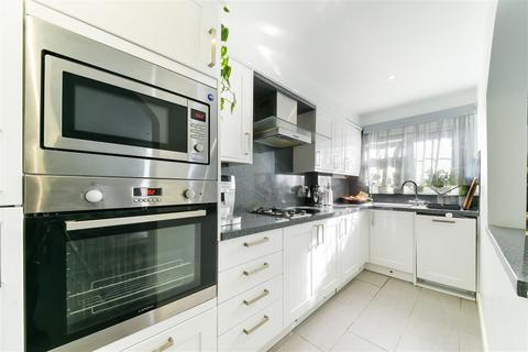 82 Hogarth Crescent, London, SW19 2DW