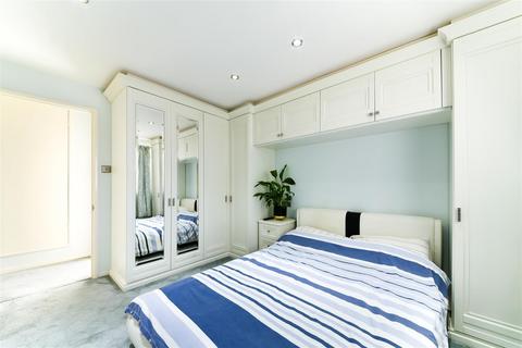 82 Hogarth Crescent, London, SW19 2DW