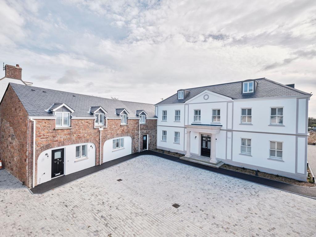 Main entrance and drop off courtyard