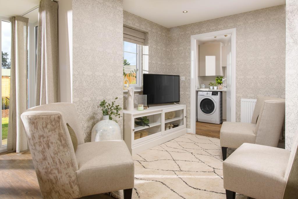 Open-plan kitchen with integrated appliances,...