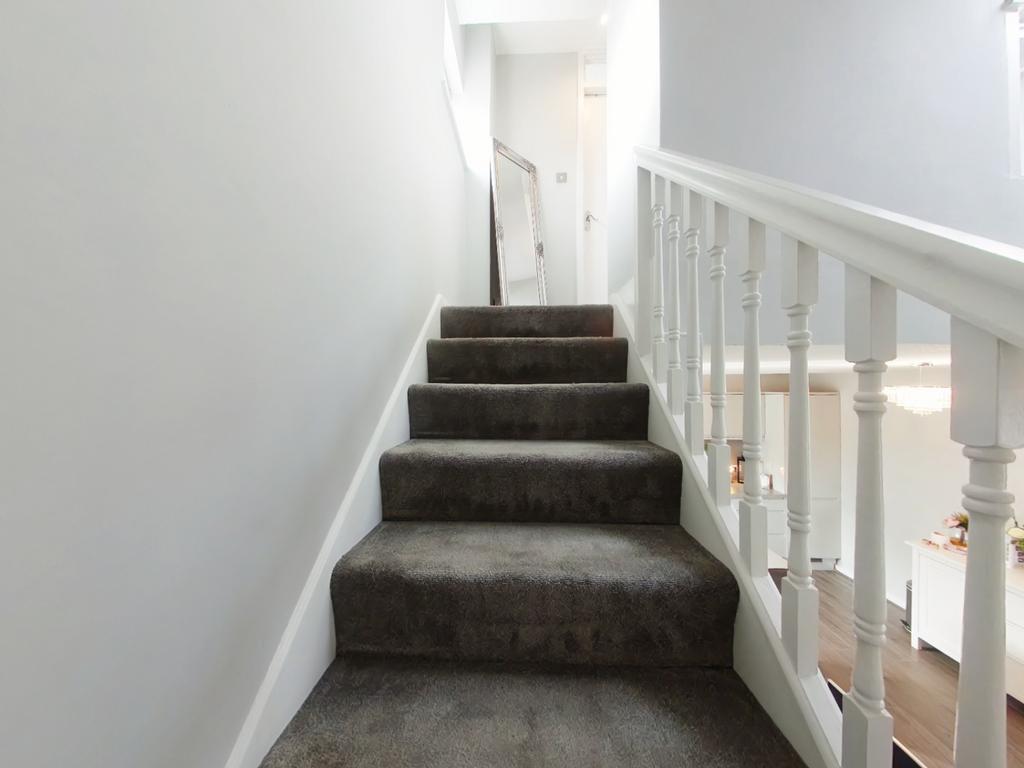 Stairs leading up to first floor