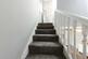 Stairs leading up to first floor