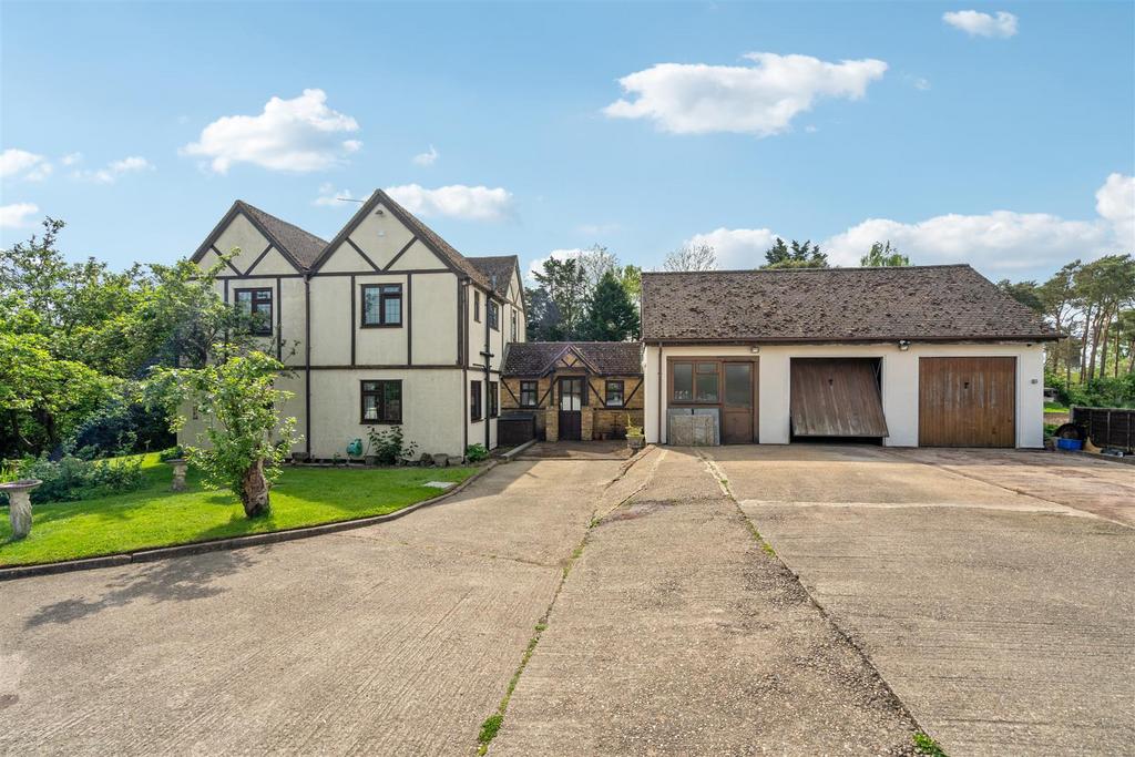 Triple Garage and Driveway