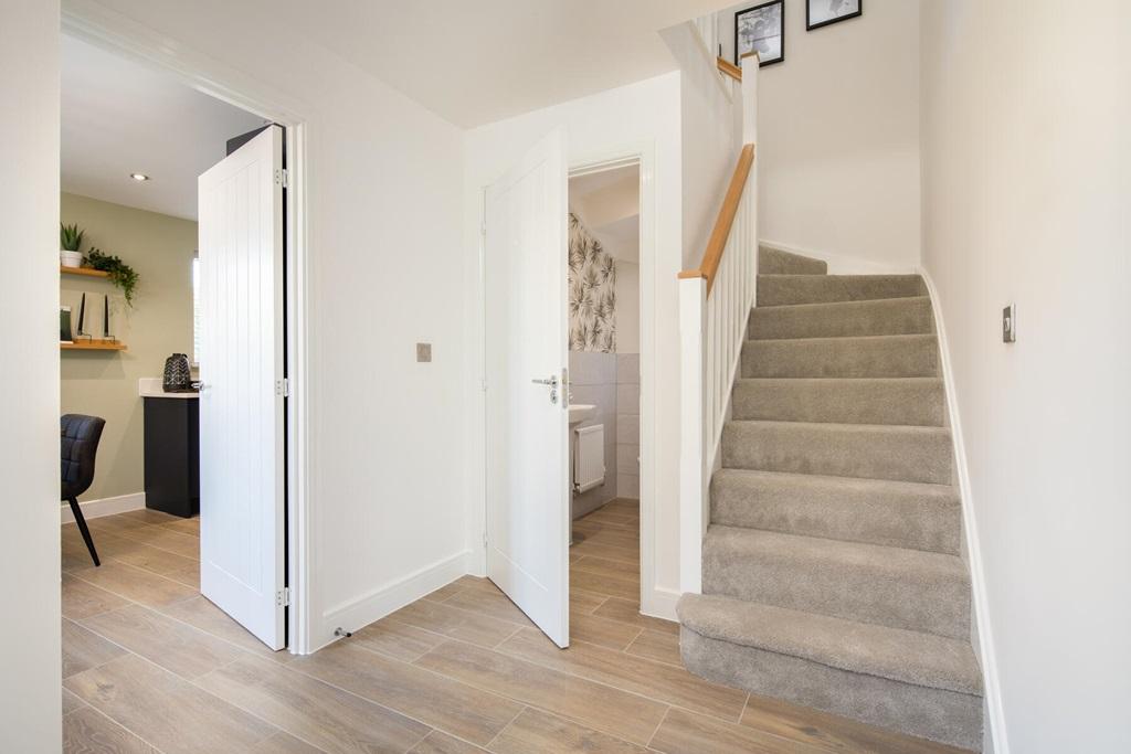 Central hallway with handy cloakroom