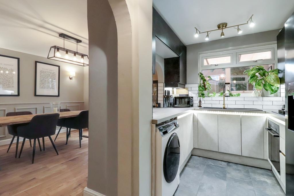 Split kitchen and dining room view