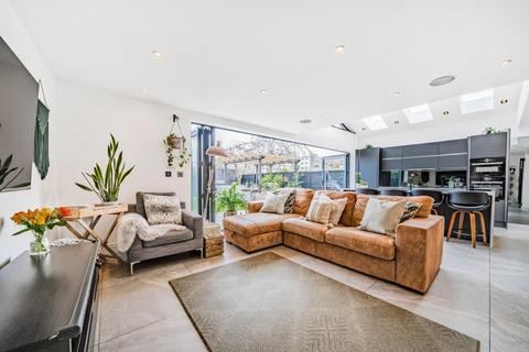75 Gap Road, London, SW19 8JF