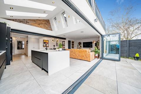 75 Gap Road, London, SW19 8JF