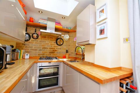 87 Kimble Road, London, SW19 2AU