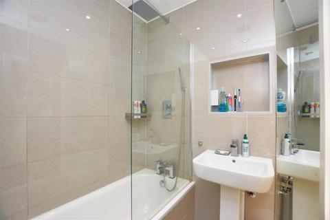 87 Kimble Road, London, SW19 2AU