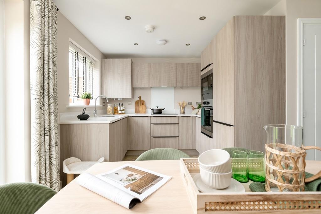 A modern and social kitchen with ample storage