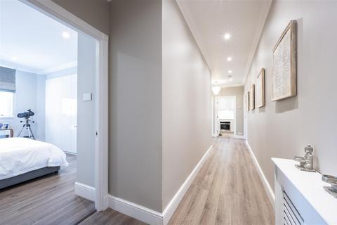 60 Chapman Square, London, SW19 5QU