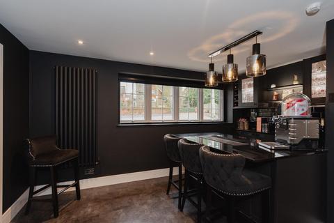 40 Downs Road, Epsom, KT18 5JD