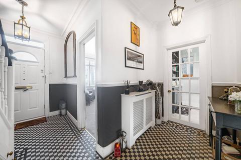 26 Ethelbert Road, London, SW20 8QE