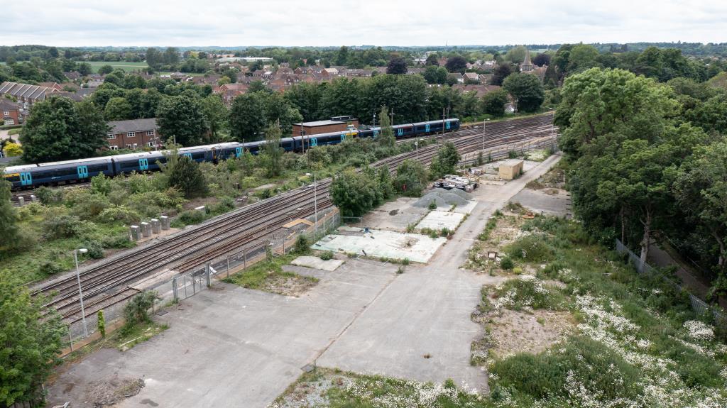 Drone shot of development site adjacent to railway