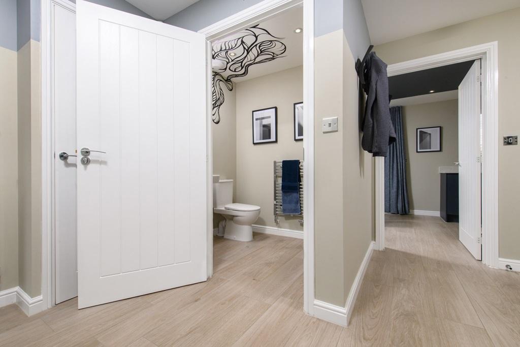 Spacious hallway with downstairs toilet area