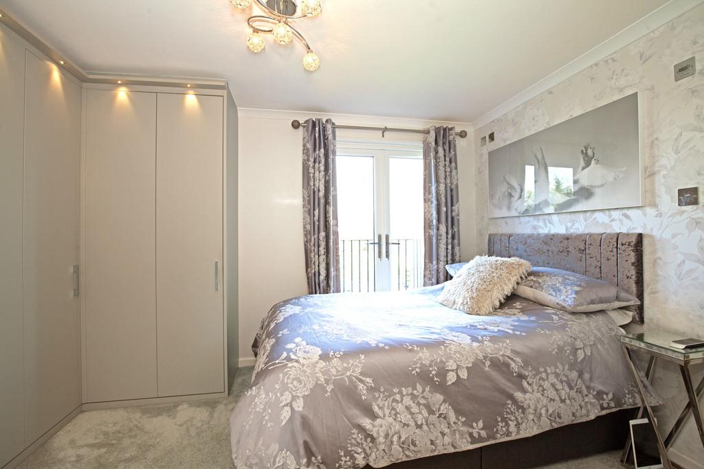 Bedroom Two with fitted wardrobes and en-suite