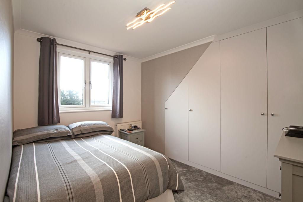 Bedroom Three with fitted wardrobes